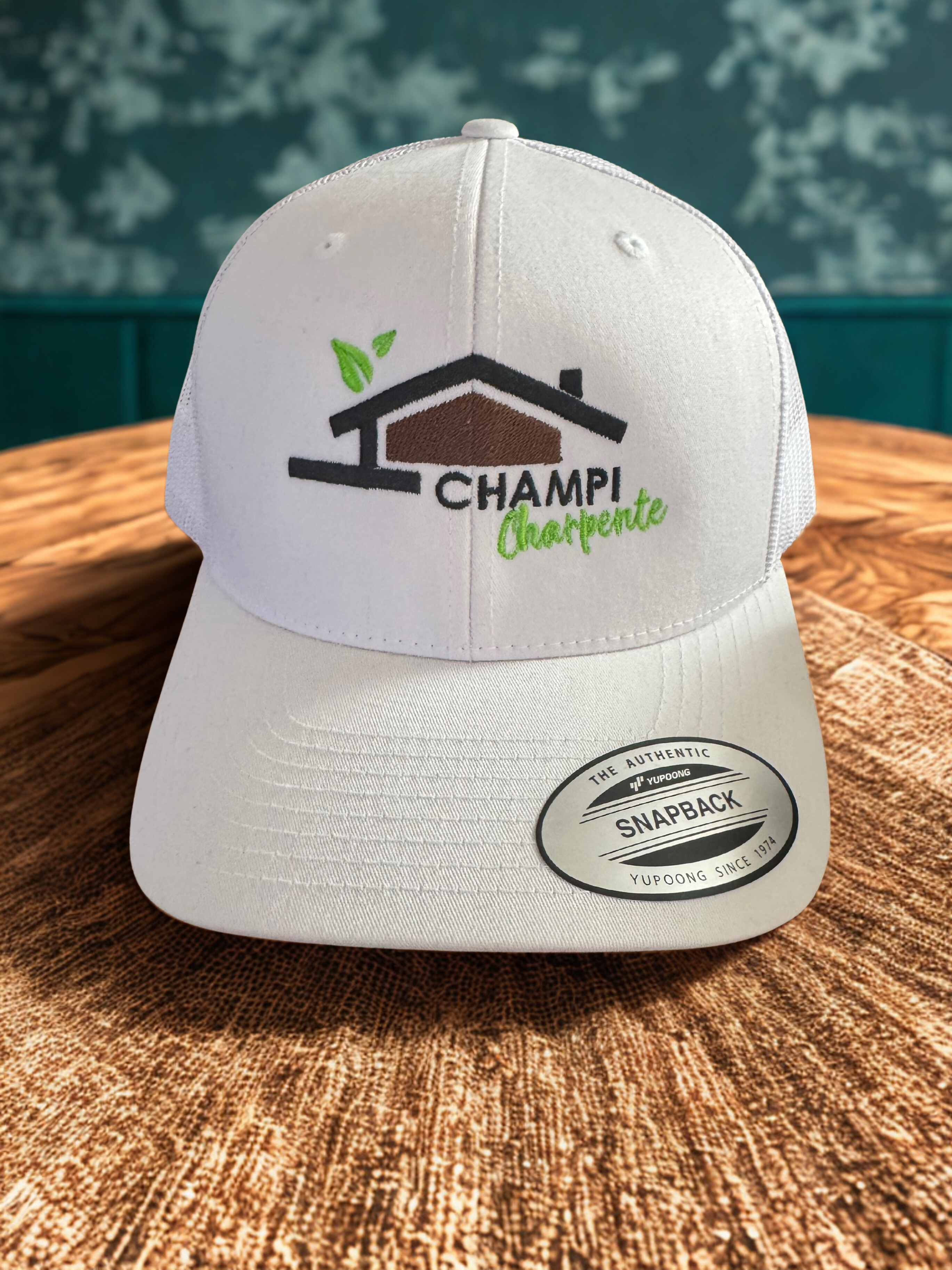 Broderie sur casquettes pour CHAMPI CHARPENTE